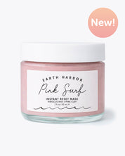 Pink facial mask jar with white lid on a white background, featuring 'Earth Harbor' branding.