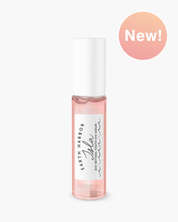 Small bottle of Earth Harbor Naturals product with a 'New!' label on a white background