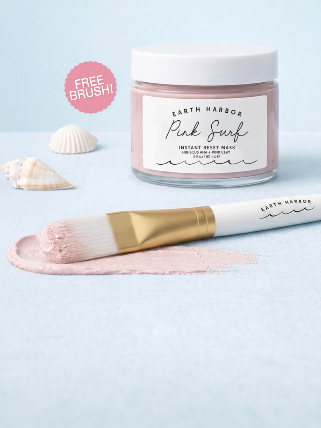 Pink surf with a brush and swatch of cream and shells next to it and Free brush button